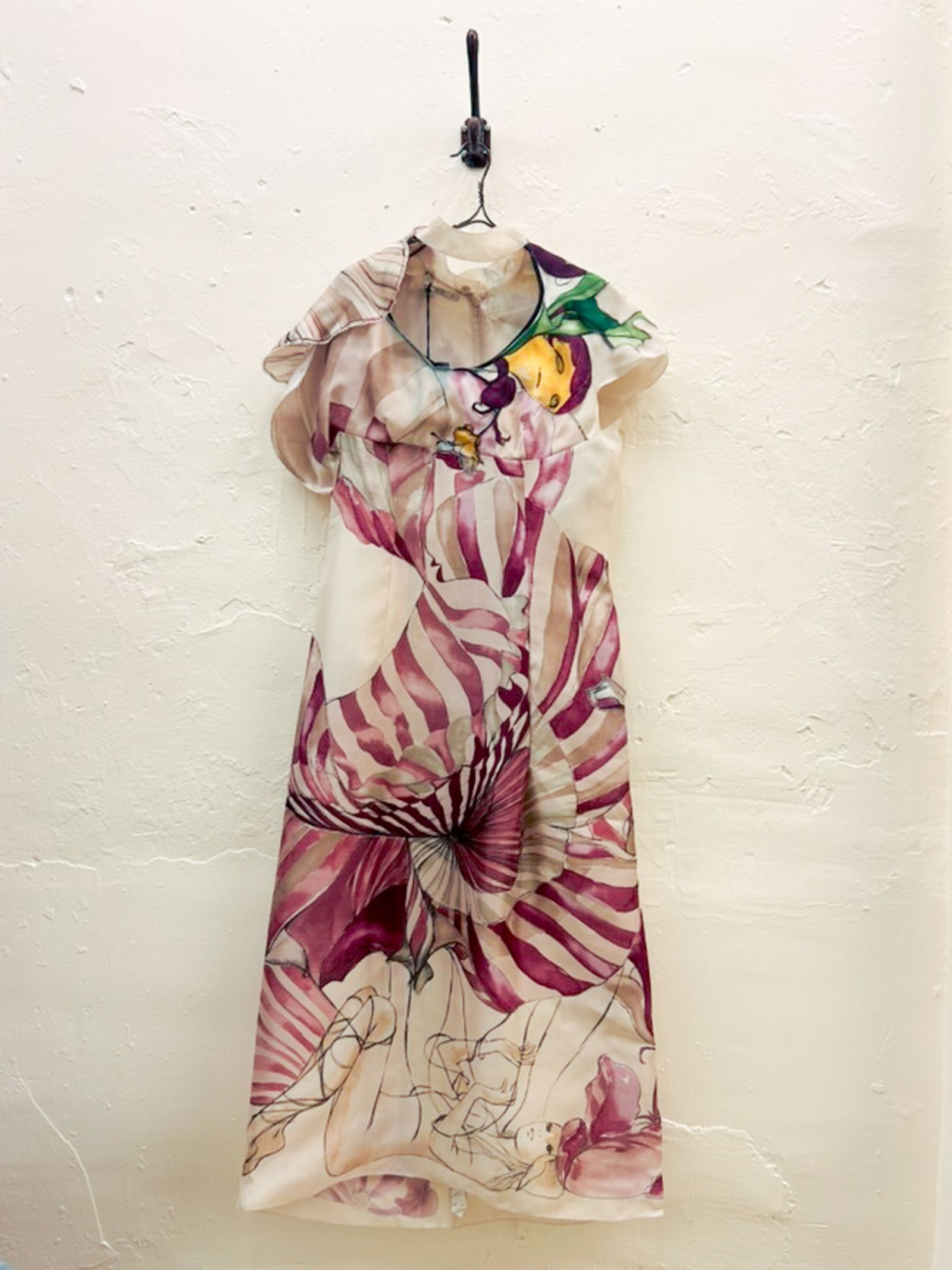 Image may contain Clothing Sleeve Beachwear Dress Adult and Person