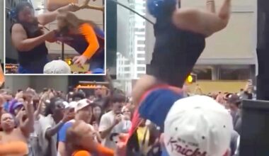 Wild video shows cat fight over Knicks parade viewing spot as woman loses pants — then twerks in orange thong