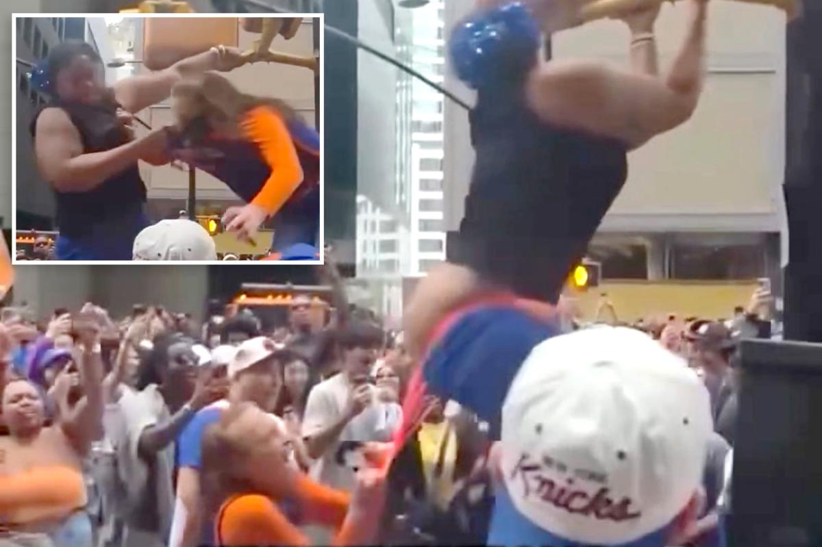 Wild video shows cat fight over Knicks parade viewing spot as woman loses pants — then twerks in orange thong