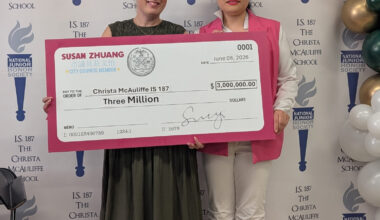 Mrs. Mina Sadiki, principal of the Christa McAuliffe School, left, receives a ceremonial check on June 8 from Councilmember Susan Zhuang. Photo: Office of Councilmember Zhuang