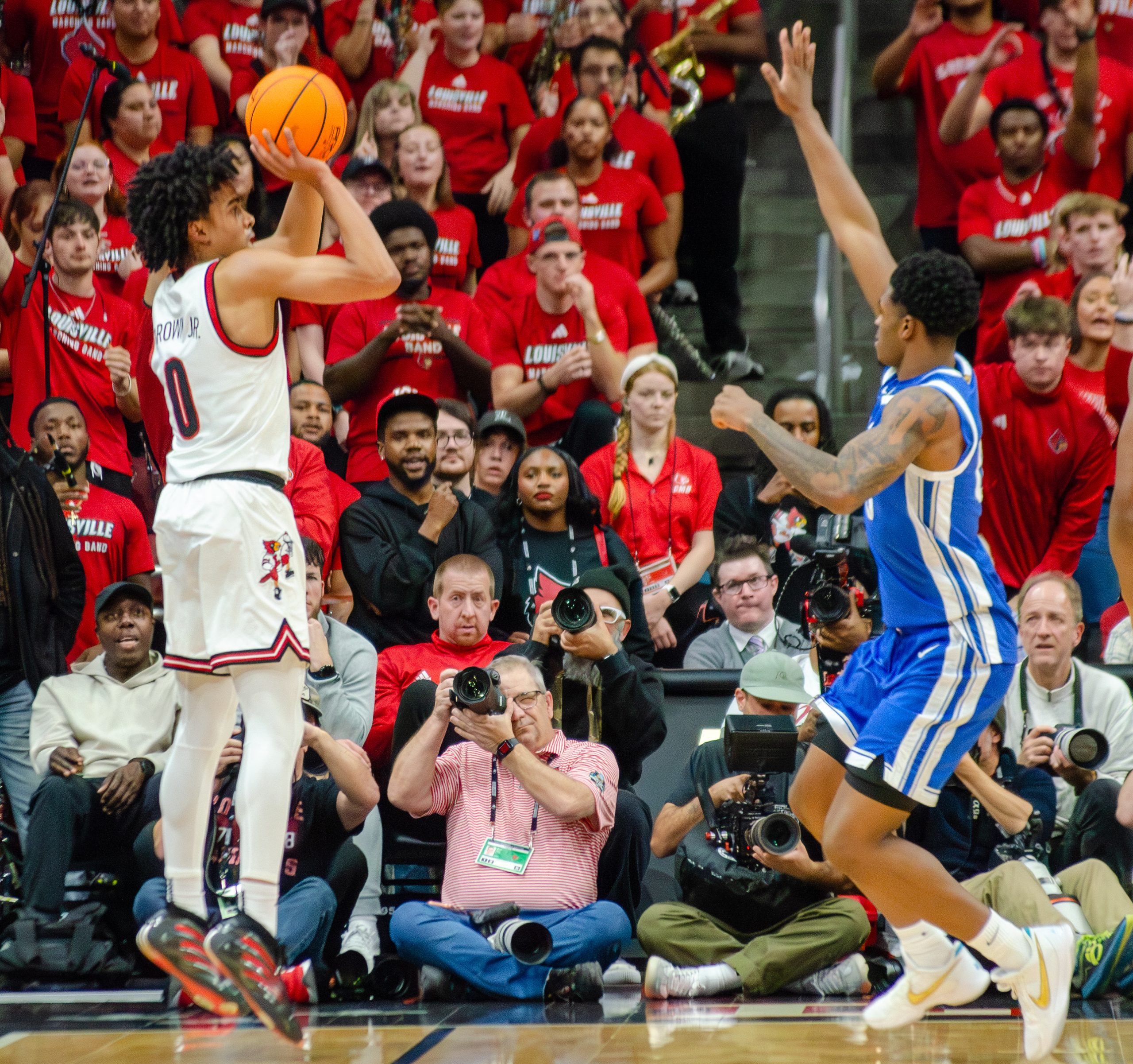 Mikel Brown Jr. shooting a three during the rivalry game versus the University of Kentucky at the KFC Yum Center on November 11, 2025 (Photo by Nolton Alfred / The Louisville Cardinal)