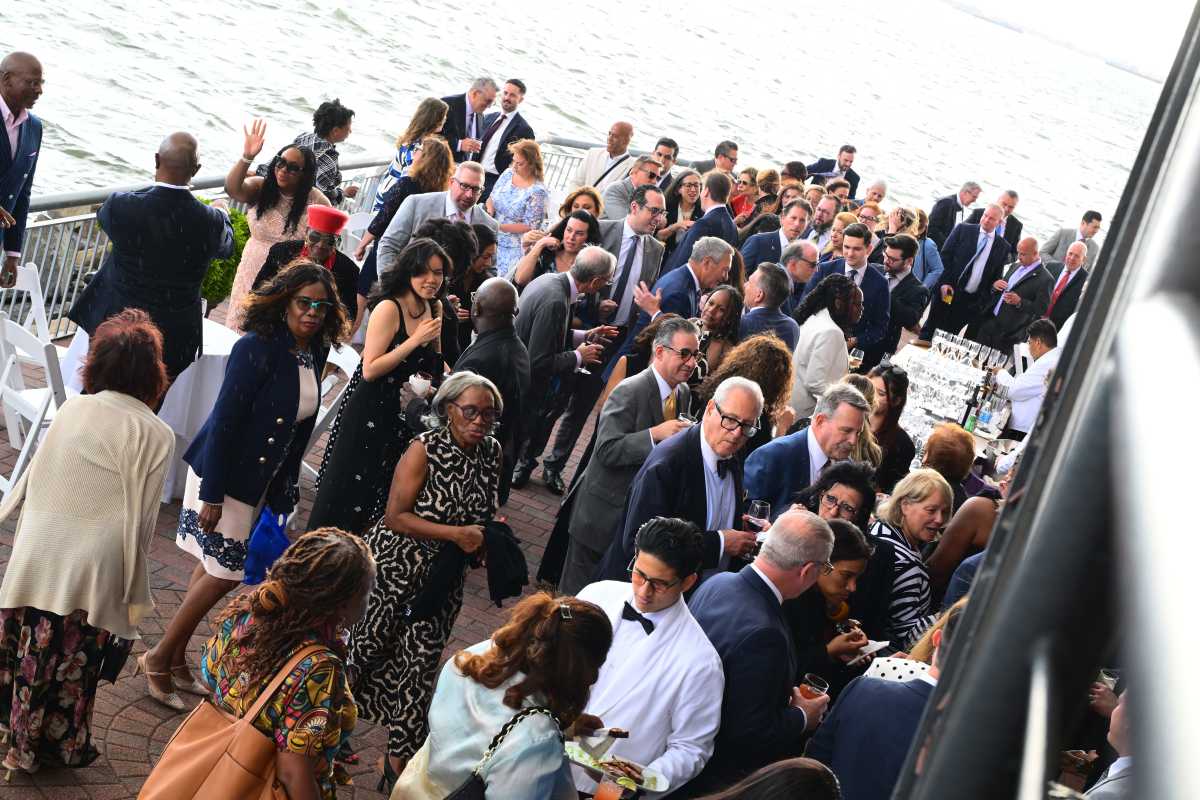 The mingling crowd at the Brooklyn Women's Bar Association gala on May 28 at Liberty Warehouse in Red Hook.