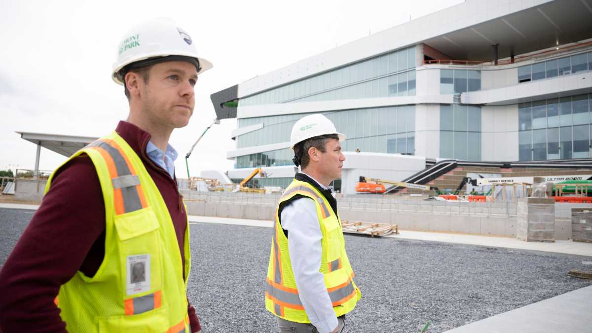 NYRA Assistant Project Director Shea Linnane and President David O'Rourke look at construction underway at the new Belmont Park.