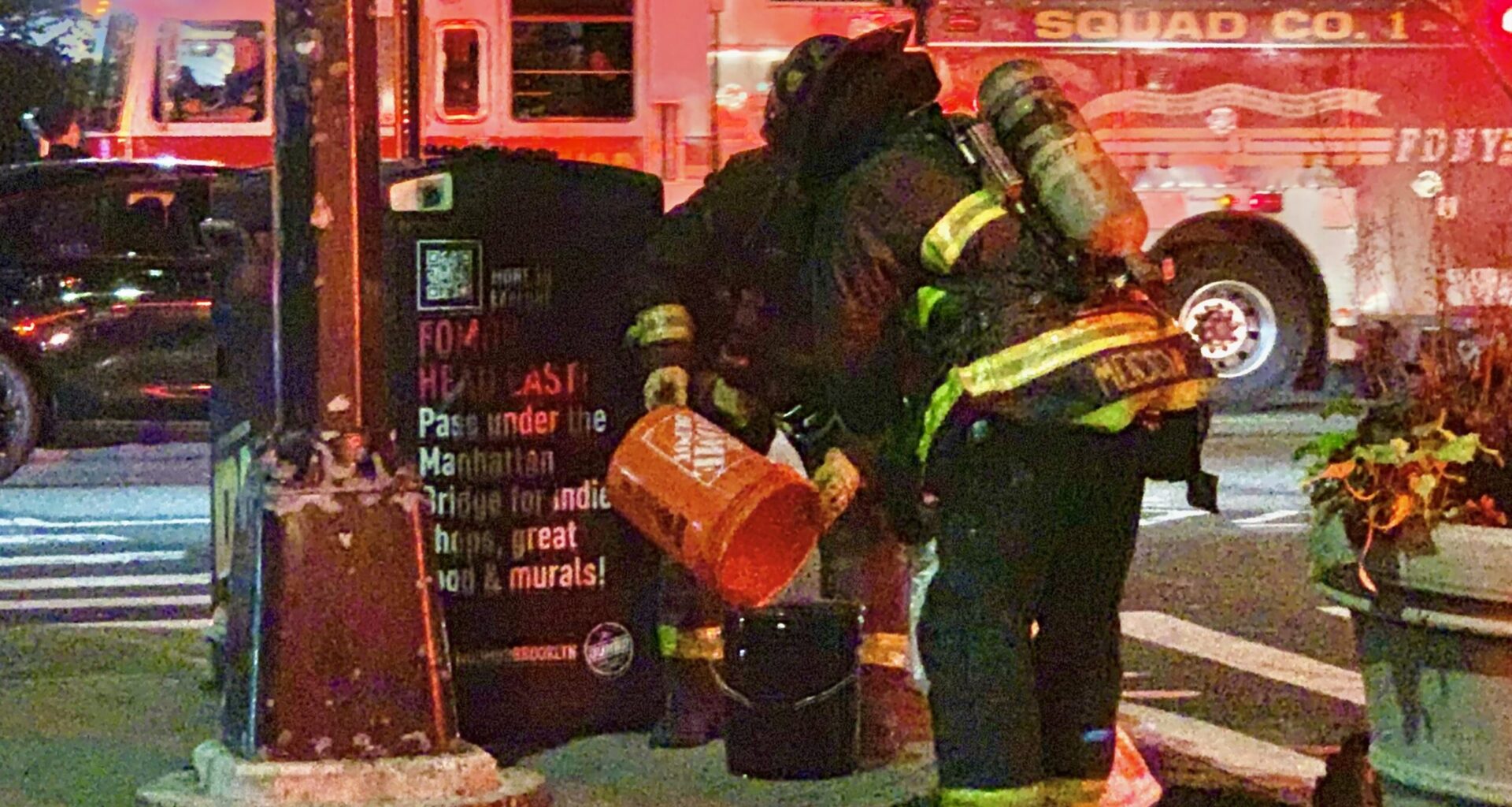 After an NYPD drone crashed in DUMBO last week, firefighters extinguished its smoking battery. Photo: Mary Frost/Brooklyn Eagle