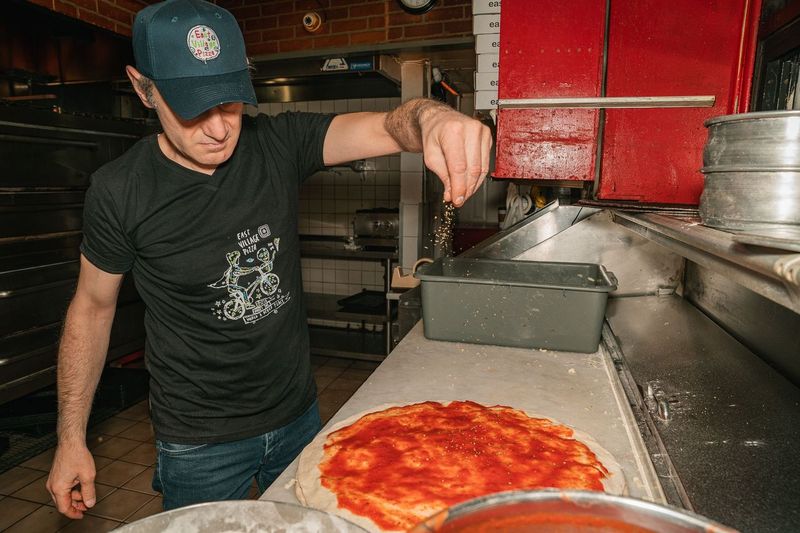 Frank Kabatas, owner of East Village Pizza