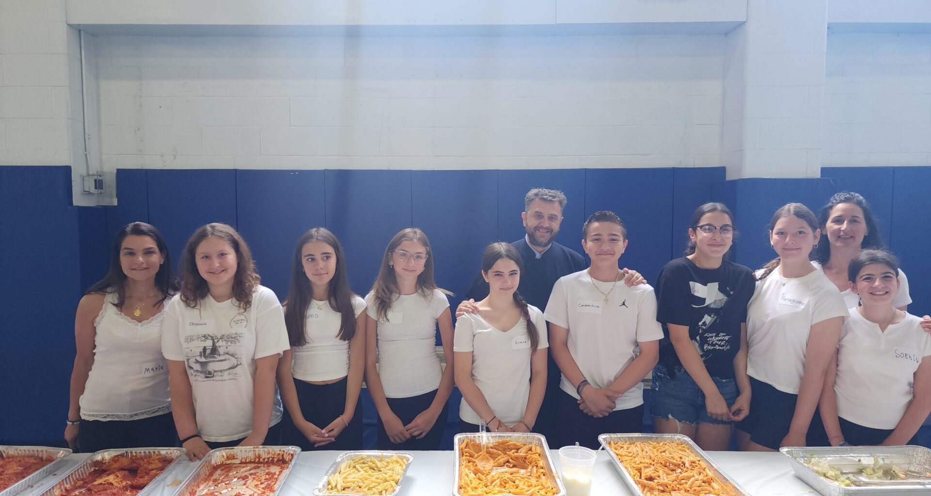 The GOYA members with Fr. Vasileios Apostolidis and their teachers, Paraskevi Langi and Maria Baggs. Photo:TNH/Michael Kakias