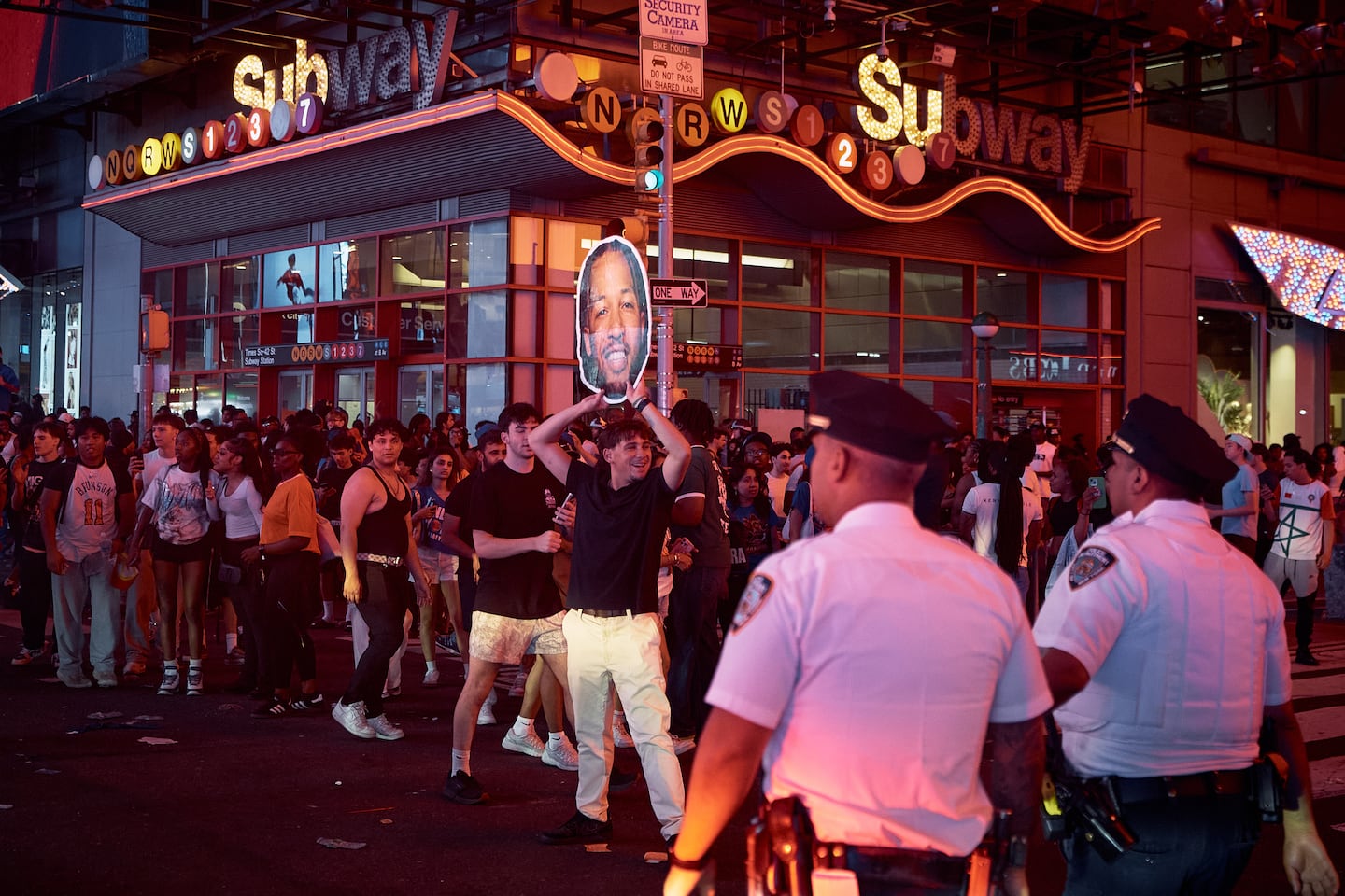 New York Knicks fans celebrate in the streets after the Knicks defeated the San Antonio Spurs to win the NBA Finals, on June 14, 2026, in New York.