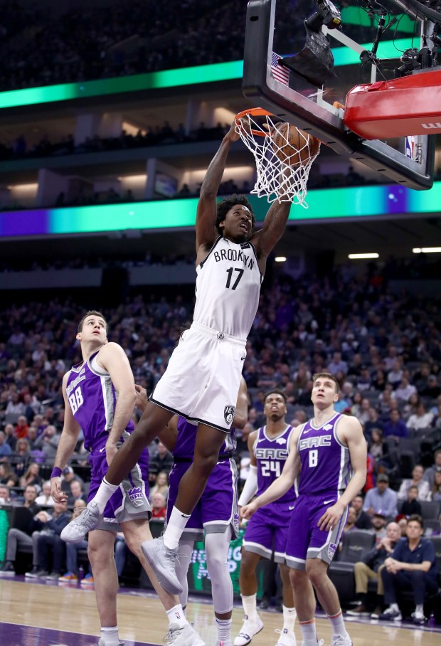 Ed Davis #17 of the Brooklyn Nets dunks the ball against the Sacramento Kings at Golden 1 Center on March 19, 2019 in Sacramento, California.