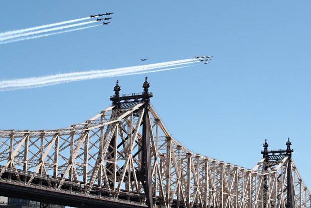 The Navy's Blue Angels and the Air Force Thunderbirds fly over Ed Koch Queensboro Bridge on April 28, 2020 in New York City. (Photo by Cindy Ord/Getty Images)