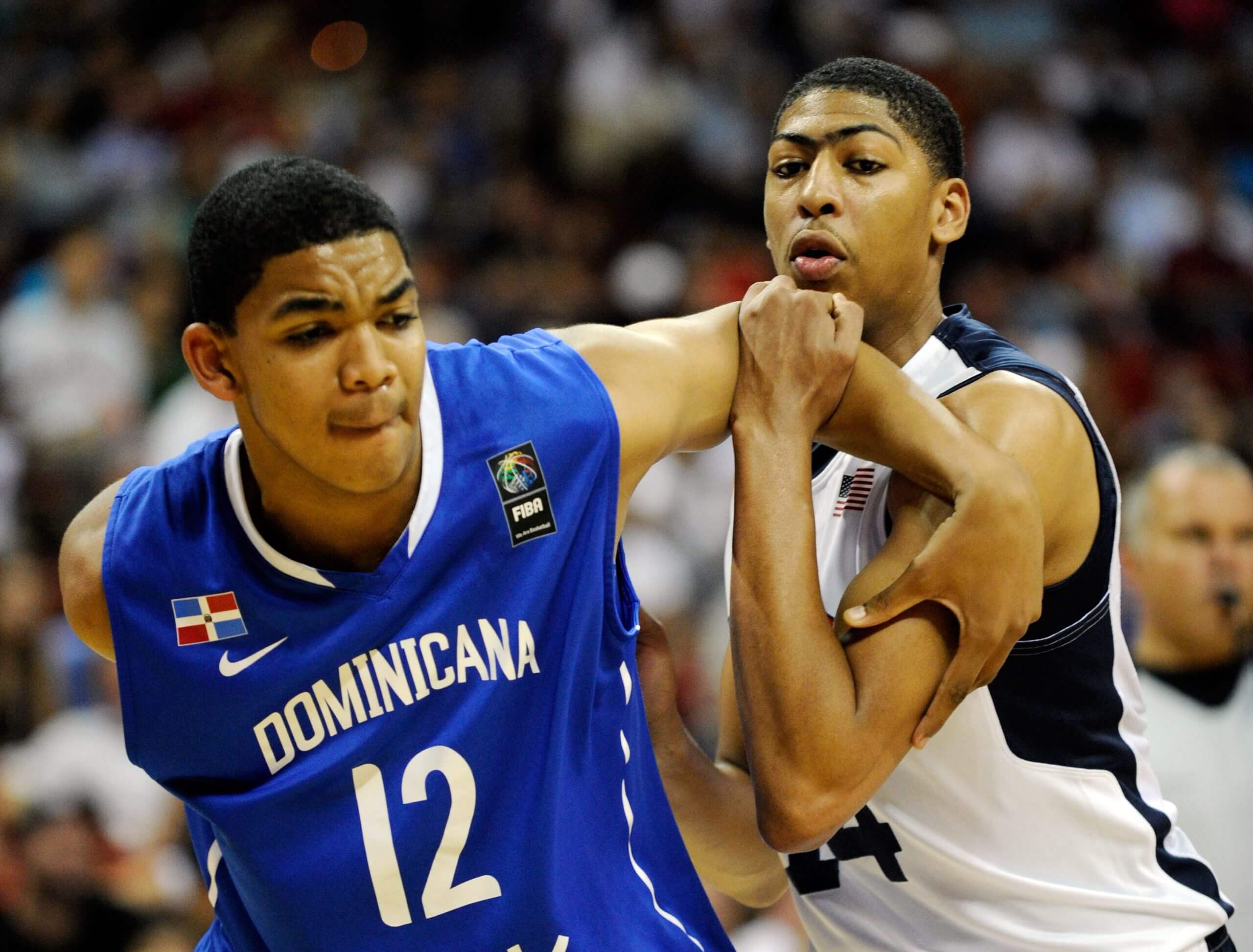 Karl-Anthony Towns of the Dominican Republic and Anthony Davis of the United States battle for a rebound during a pre-Olympic exhibition game in Las Vegas in 2012. (David Becker / Getty Images)