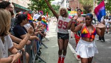 Attendees outside the Stonewall Inn during the NYC Pride March in New York, US, on Sunday, June 29, 2025. New York City Pride's theme for 2025, "Rise Up: Pride in Protest," honors the legacy of the very first Pride March in 1970, which commemorated the one-year anniversary of the Stonewall Riots. Photographer: Klaus Galiano/Bloomberg via Getty Images