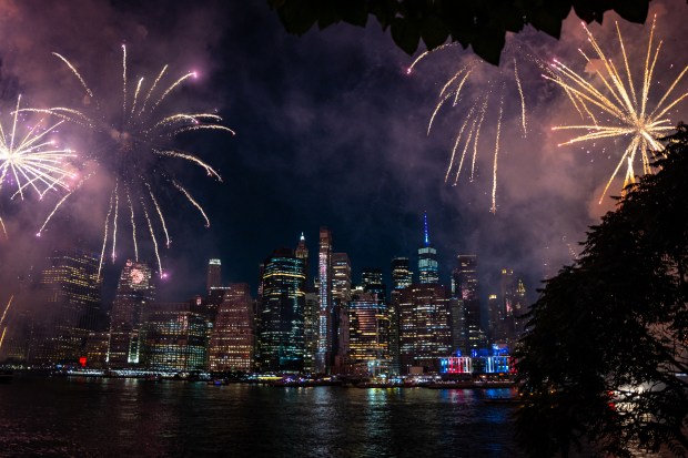 Fireworks light up the Manhattan skyline during the Macy's Fourth of July Fireworks celebration on the East River at Brooklyn Bridge Park on July 4, 2025.