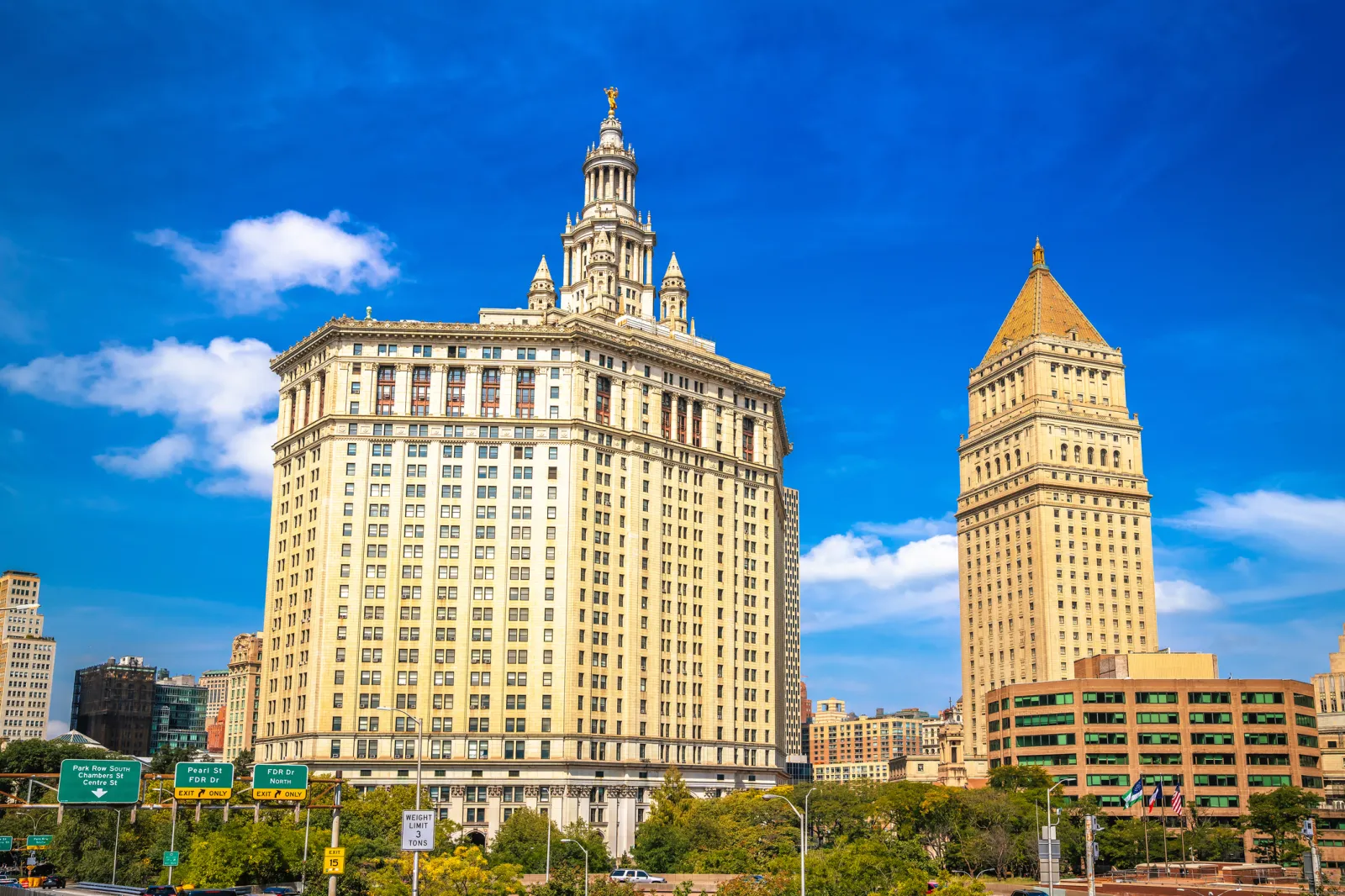 An exterior view of the Municipal Building (pictured left) in New York City.