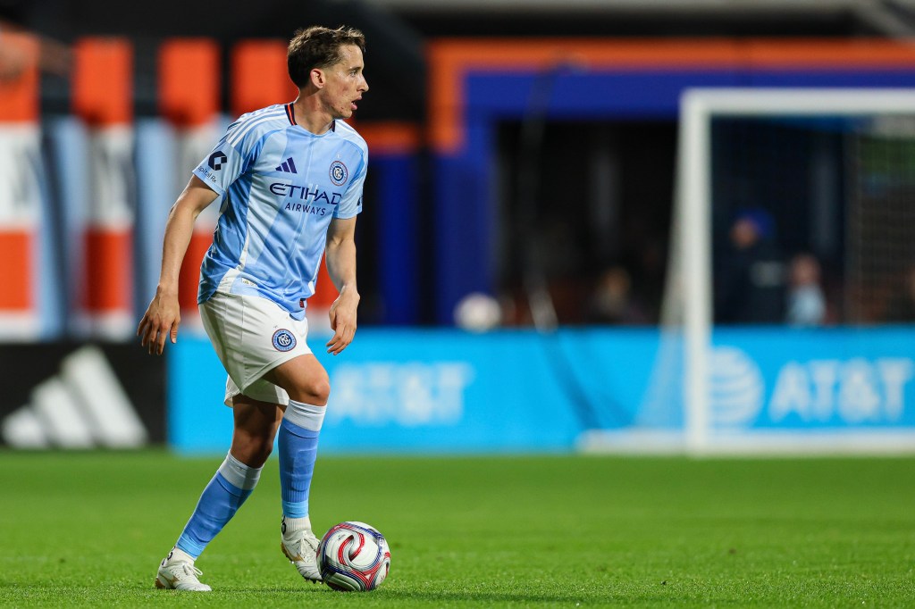 Kai Trewin #5 of New York City FC dribbles the ball against Charlotte FC during the first half at Citi Field on April 18, 2026 .
