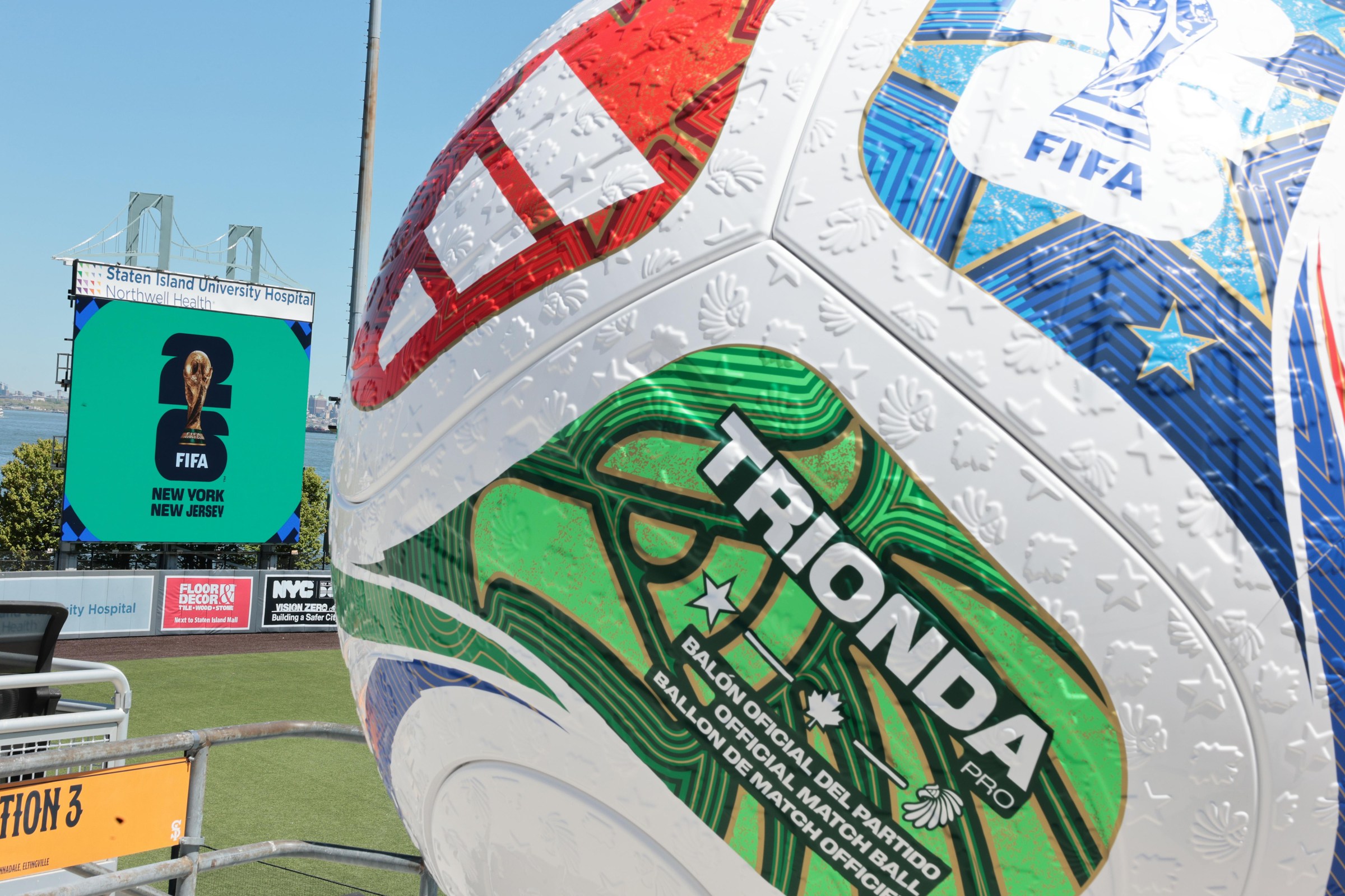 A huge soccer ball outside.