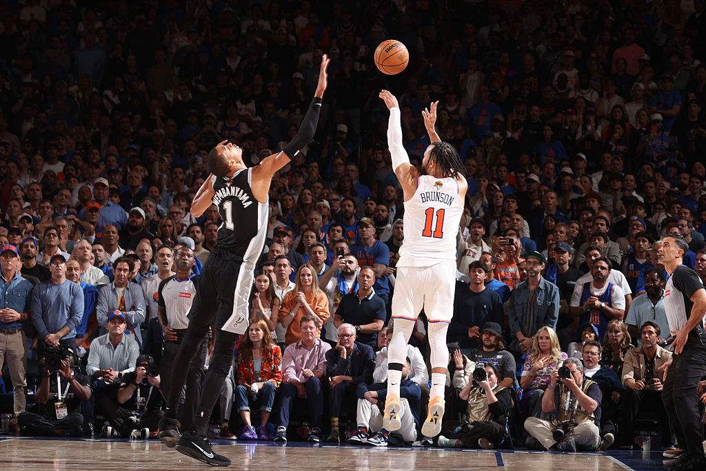 NEW YORK, NY - JUNE 10: Jalen Brunson #11 of the New York Knicks shoots a three point basket over Victor Wembanyama #1 of the San Antonio Spurs during the game during Game Four of the 2026 NBA Finals on June 10, 2026 at Madison in New York, New York. NOTE TO USER: User expressly acknowledges and agrees that, by downloading and or using this photograph, User is consenting to the terms and conditions of the Getty Images License Agreement. Mandatory Copyright Notice: Copyright 2026 NBAE(Photo by Nathaniel S. Butler/NBAE via Getty Images)