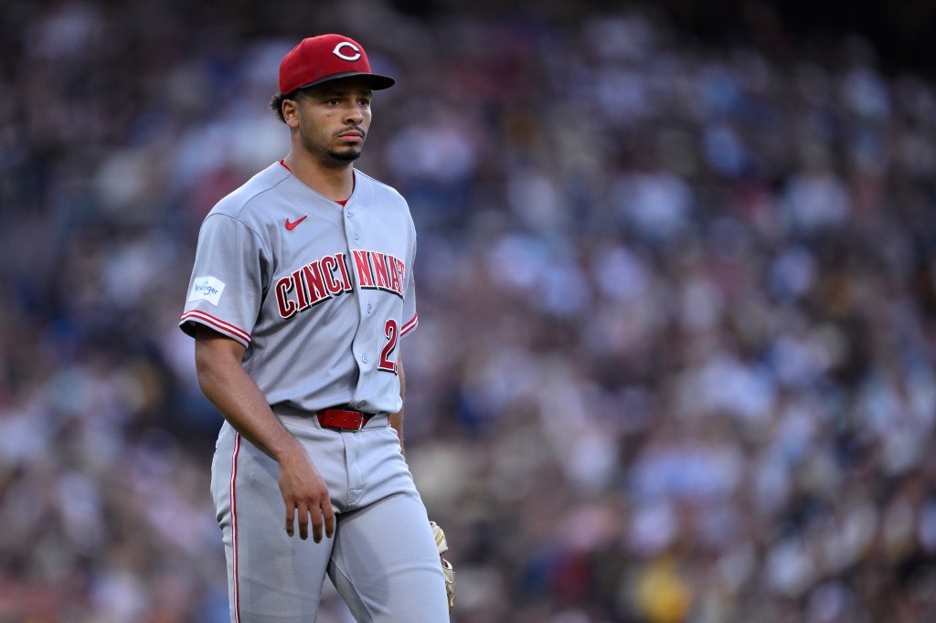 Cincinnati Reds player in uniform on the field.
