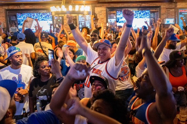 NEW YORK, NEW YORK - JUNE 13: New Yorkers watch the closing moments of Game 5 of the NBA finals at Harlem Tavern on June 13, 2026 in New York City. The Knicks closed out the San Antonio Spurs to win their first championship since 1973. (Photo by Jeremy Weine/Getty Images)