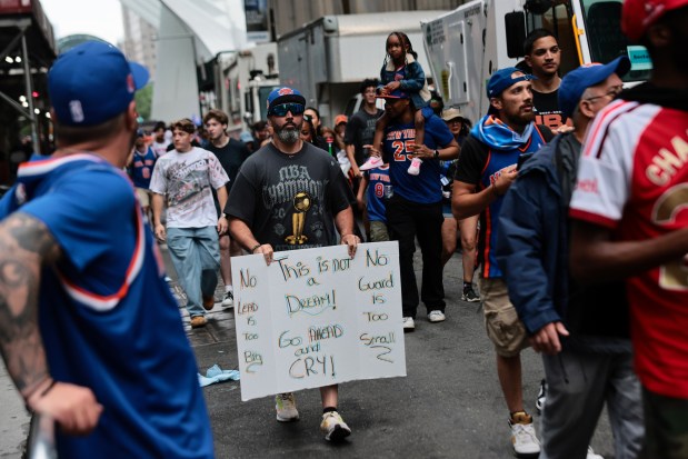 NEW YORK, NEW YORK - JUNE 18: Fans arrive ahead of the New York Knicks Championship ticker tape parade and victory rally celebrating winning the 2026 NBA Finals on June 18, 2026 in New York City. The New York Knicks defeated the San Antonio Spurs in five games to win their first NBA Championship in 53 years. (Photo by Michael M. Santiago/Getty Images)