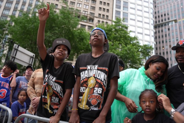 NEW YORK, NEW YORK - JUNE 18: Fans arrive prior to the New York Knicks Championship ticker tape parade and victory rally celebrating winning the 2026 NBA Finals on June 18, 2026 in New York City. The New York Knicks defeated the San Antonio Spurs in five games to win their first NBA Championship in 53 years. (Photo by Angelina Katsanis/Getty Images)