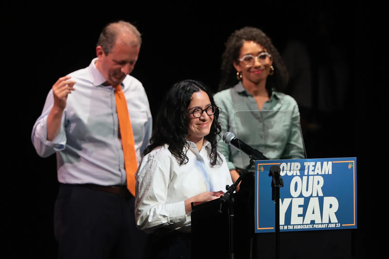 Congressional candidates Brad Lander (left), Claire Valdez (center) and Darializa Avila Chevalier (right) attend a "Get Out the Vote" rally at Kings Theater in New York City on June 18.