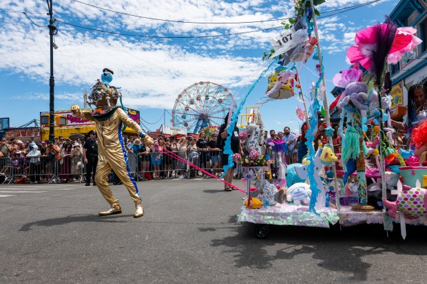 NEW YORK, NEW YORK - JUNE 20: Revelers participate in the annual Mermaid Parade at Coney Island on June 20, 2026 in the Brooklyn borough of New York City. Now in its 44th year, over 3,000 marchers and thousands of spectators came out for the event to celebrate the arts, the ocean and the Coney Island neighborhood and boardwalk in Brooklyn. (Photo by Spencer Platt/Getty Images)