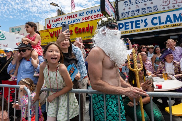 NEW YORK, NEW YORK - JUNE 20: Revelers attend the annual Mermaid Parade at Coney Island on June 20, 2026 in the Brooklyn borough of New York City. Now in its 44th year, over 3,000 marchers and thousands of spectators came out for the event to celebrate the arts, the ocean and the Coney Island neighborhood and boardwalk in Brooklyn. (Photo by Spencer Platt/Getty Images)