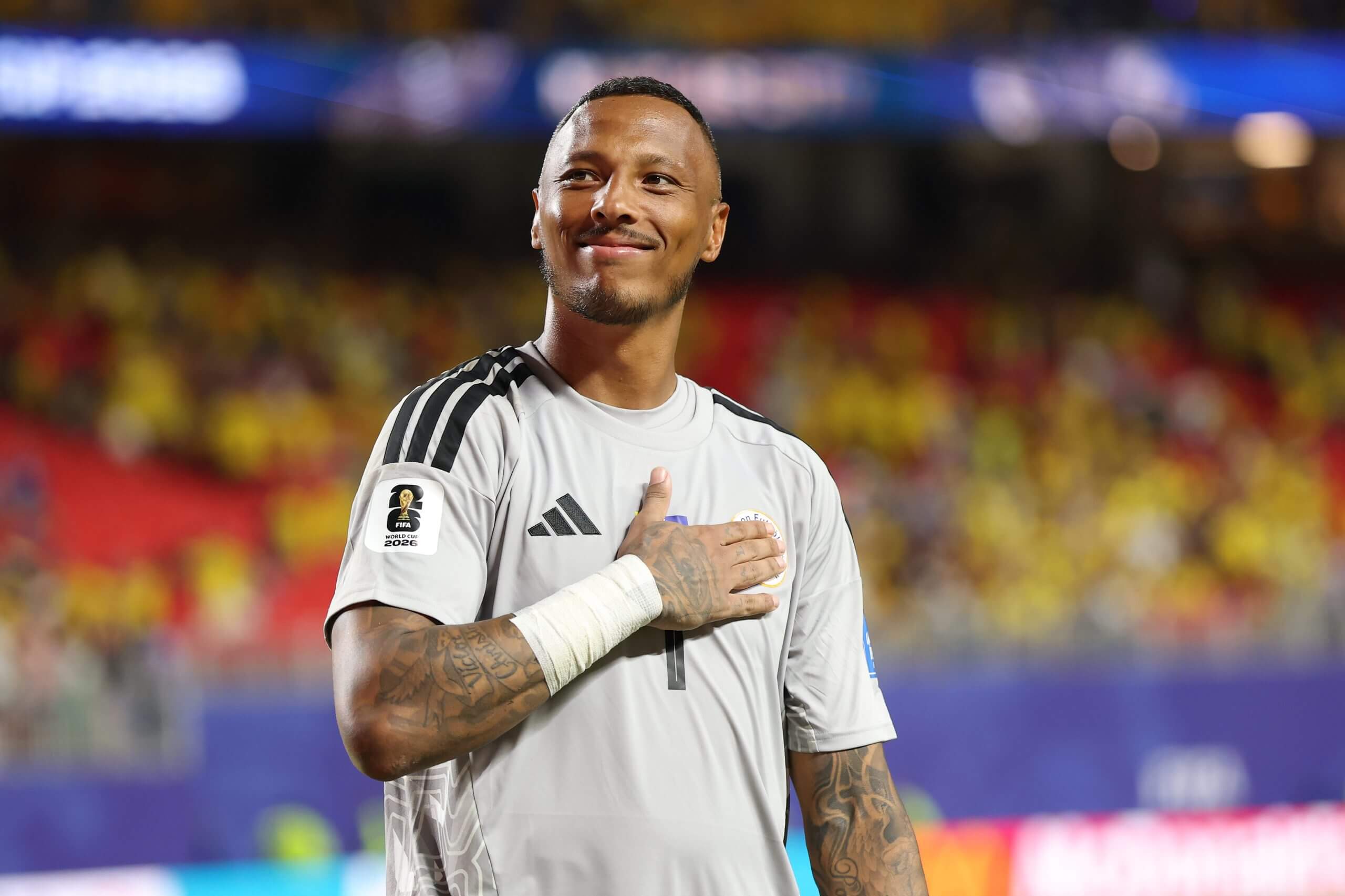 Eloy Room pats the Curacao badge on his chest