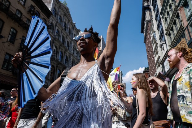 Participants take part in the annual New York City Pride March in New York on June 28, 2026. (Photo by kena betancur / AFP via Getty Images)