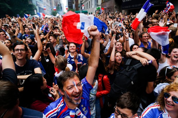 NEW YORK, NY - JULY 15: Fans celebrate France winning the World Cup final against Croatia during a watch party on July 15, 2018 in New York City. France beat Croatia 4-2 to win its second World Cup title. (Photo by Eduardo Munoz Alvarez/Getty Images)