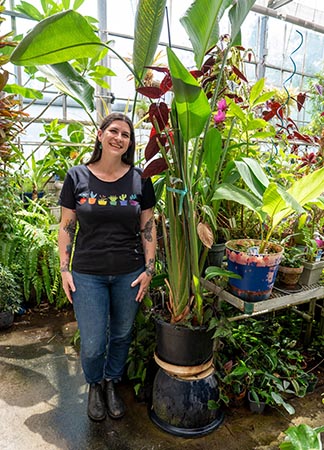 Haley Frey with tall palm tree