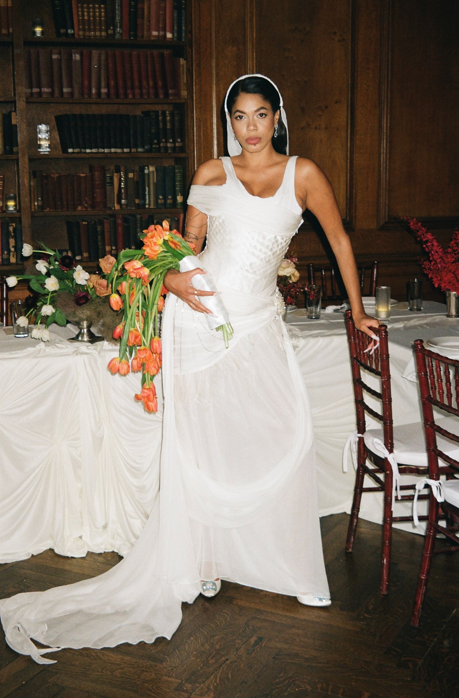 Image may contain Flower Flower Arrangement Flower Bouquet Plant Face Head Person Photography Portrait and Clothing