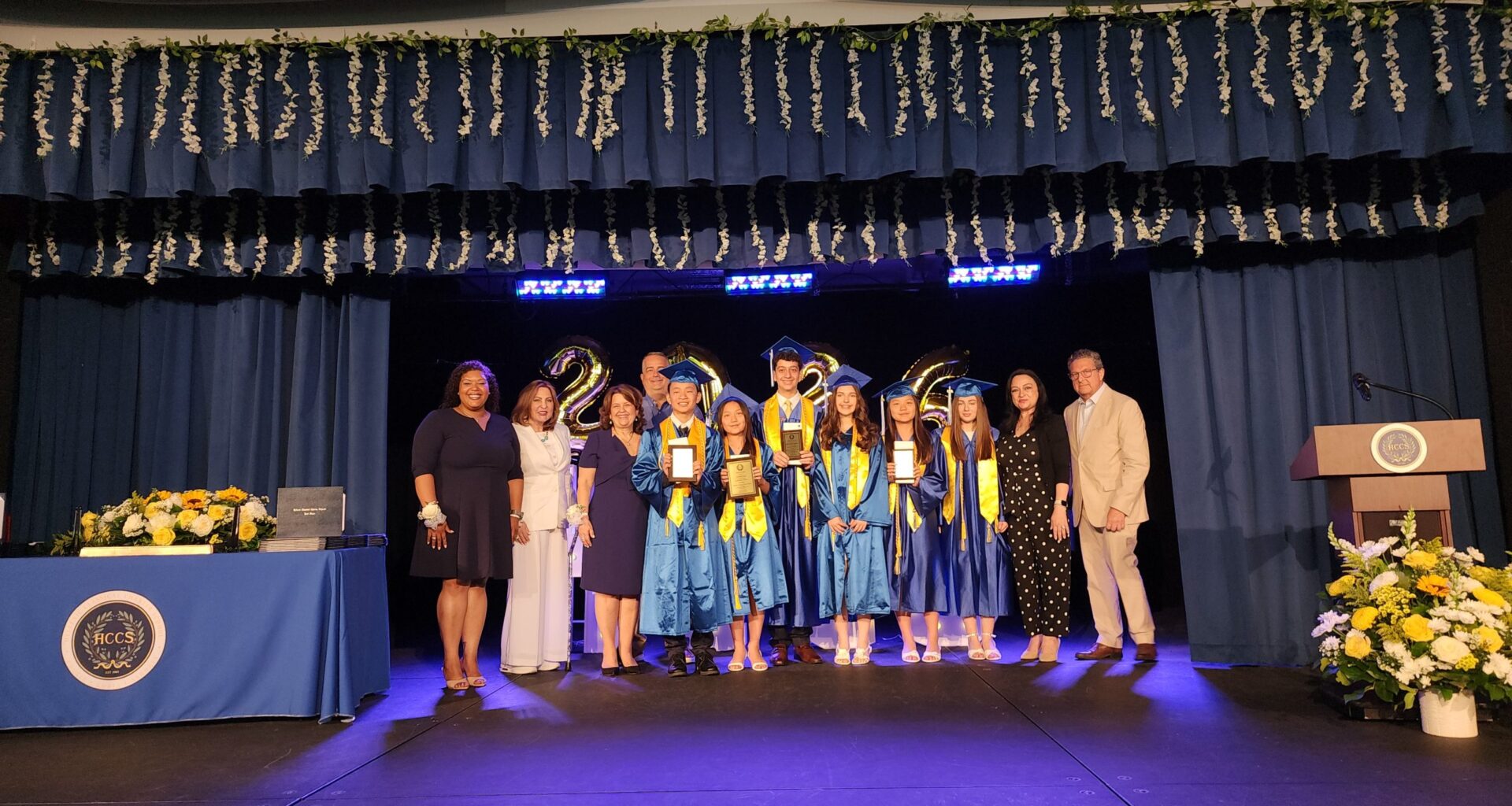 The award-winning students, Ryan Liu, Cosette Lee, Konstantinos Anagnostou, Stella Weidmann, Demi Lee, and Anastasia Papasmiris, with members of the school’s leadership and faculty. Left to right: Natasha Caban, Anastasia Etimos, Christina Tettonis, Spiros Moustakas, Joy Petrakos, and Charles Capetanakis. Photo: TNH/Michael Kakias