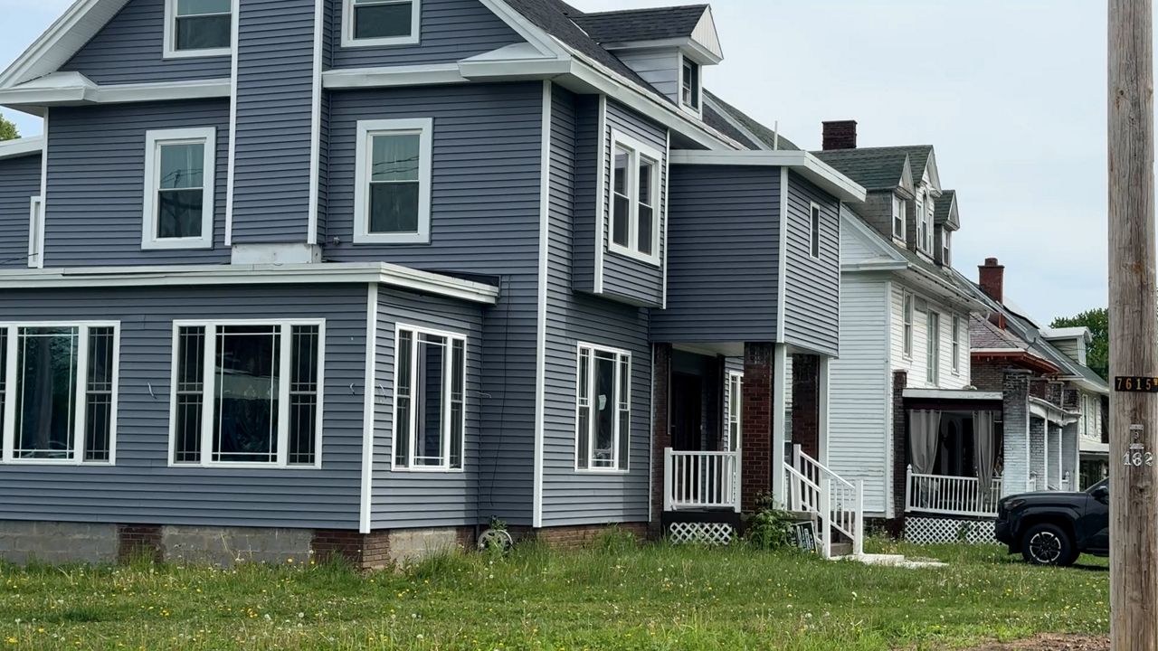 A blue two story home