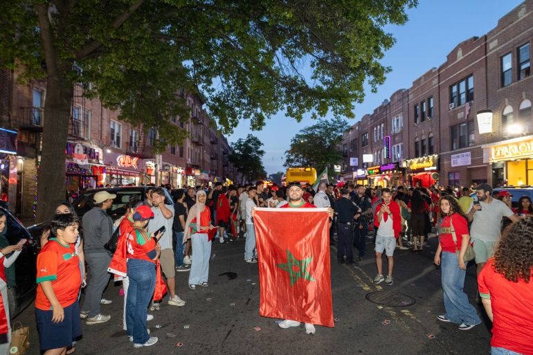 Fans watch Morocco vs Haiti at a screening in New York [Daleelah Saleh/Al Jazeera]