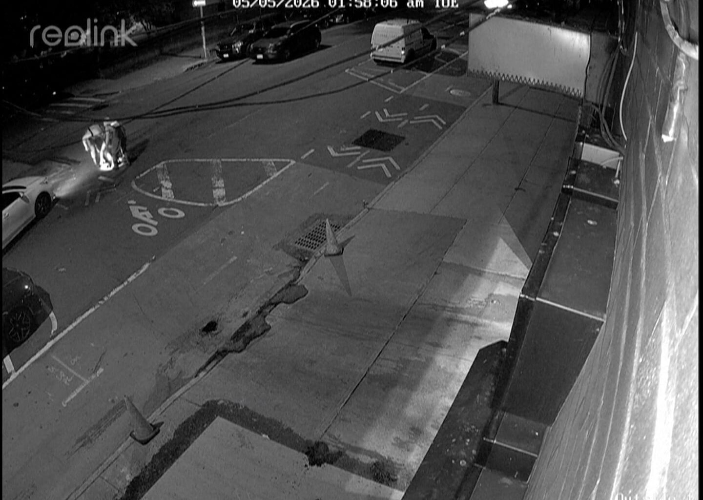 In an image created from surveillance video provided by Aki Auto Care, three people descended into a sewer on a street in New York last month.