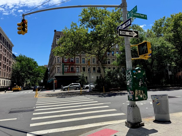 The victim and a 14-year-old passenger were zooming down W. 112th St. on a Razor MX350 Dirt Rocket electric bike when he tried to maneuver around a vehicle turning left on Adam Clayton Powell Jr. Blvd. (Rebecca White/New York Daily News)