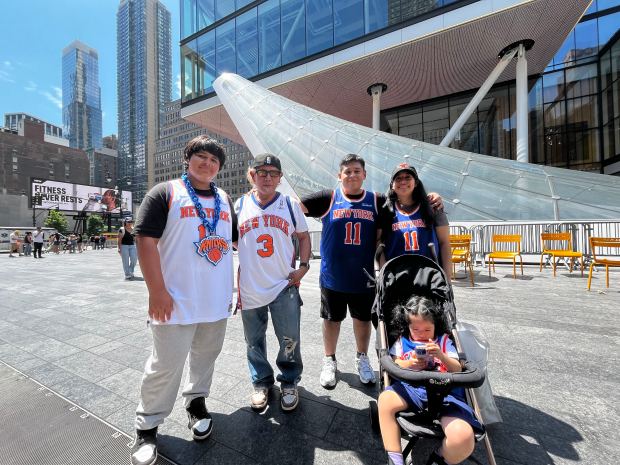 Dylan Apaza and his family outside of MSG on Friday, June 12, 2026. (Julian Roberts-Grmela/New York Daily News)