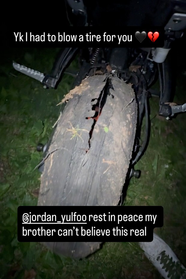Danny, founder of the Hot Boys motorcycle club, blew out his tire during a burnout at the memorial for his friend, Jordan Yulfo. (Obtained by Daily News)