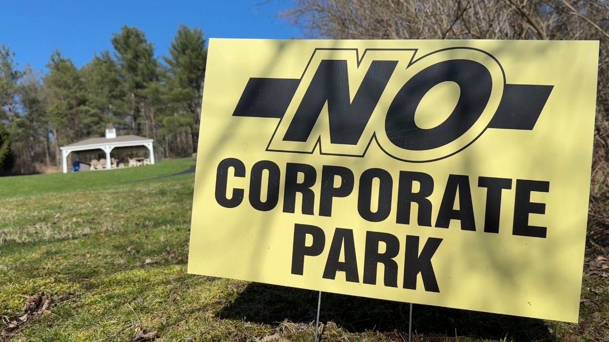 A sign in John Feehan's yard reads "No Corporate Park". (Spectrum News/Natalie Mooney)