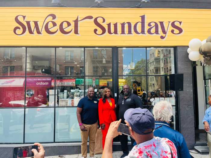 Josue Pierre, Farah Lous, and Anthony Beckford outside of Sweet Sundays Café and Eatery.
