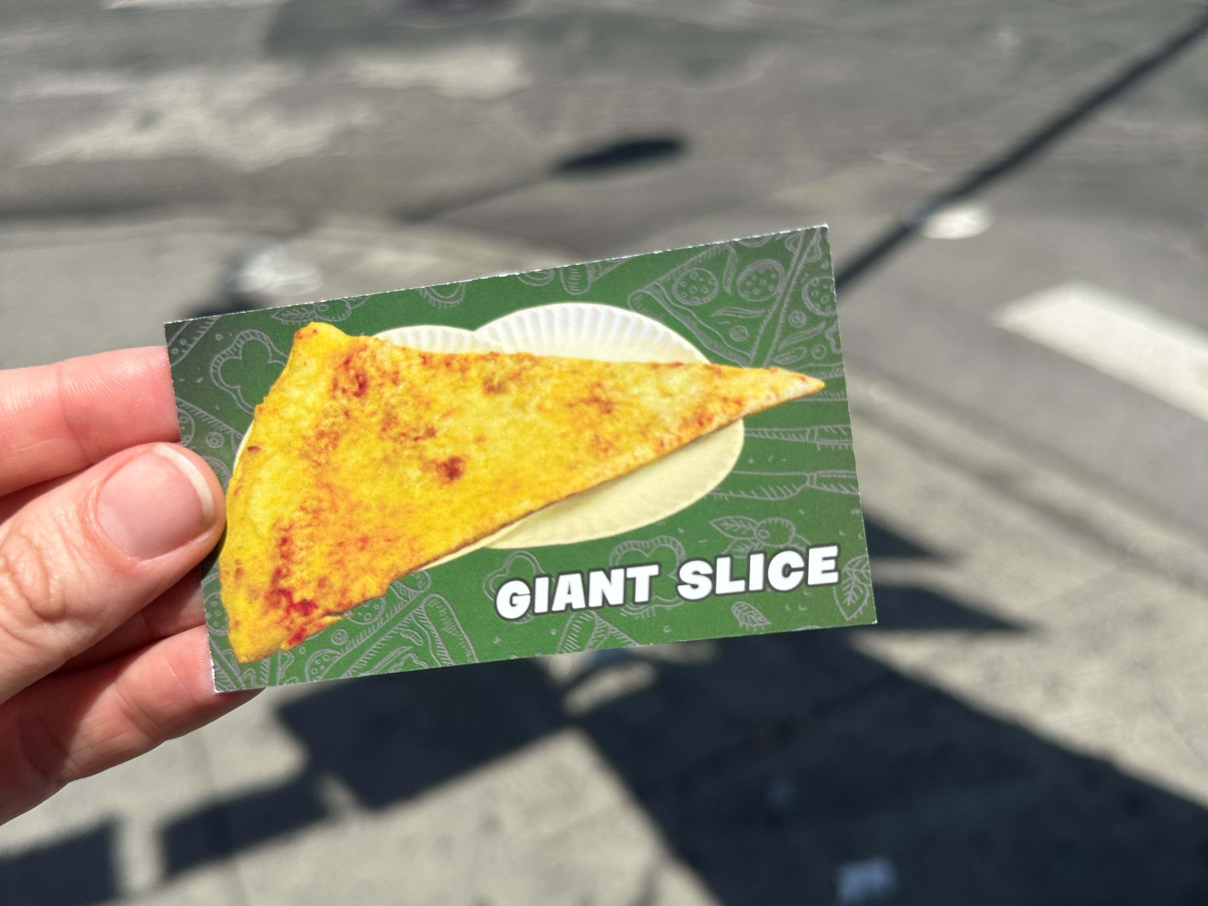 business card with a giant slice on it that says "Giant Slice"