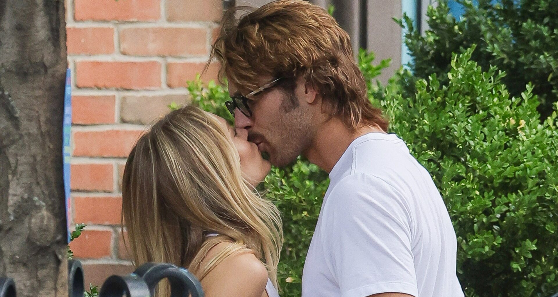 Glen Powell and new girlfriend Michelle Randolph share passionate kiss on stroll through NYC