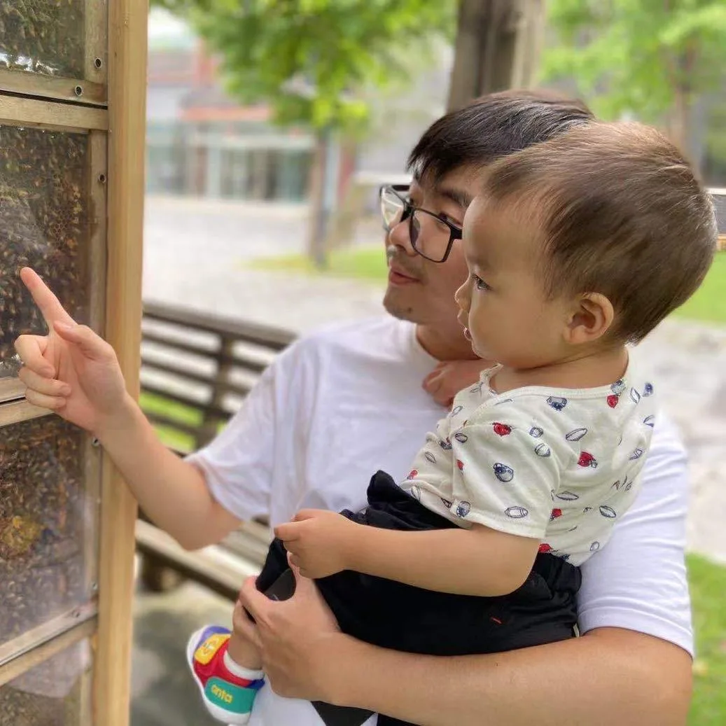 Kai Wang and his son