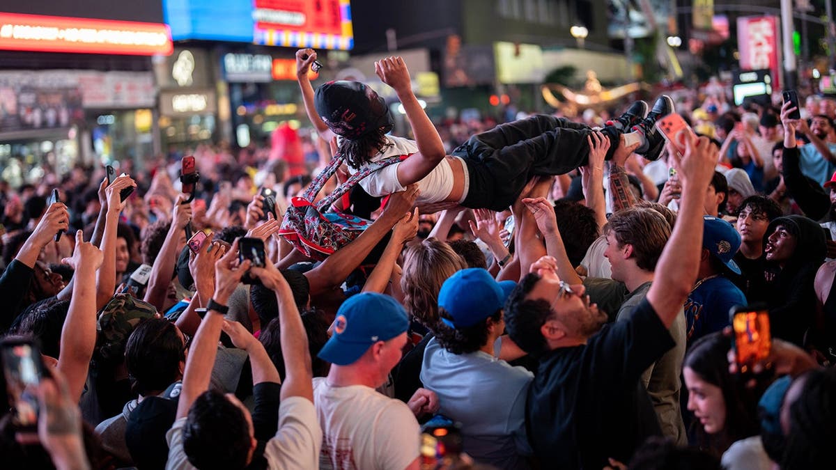 New York Knicks fans celebrating a win in the 2026 NBA Finals