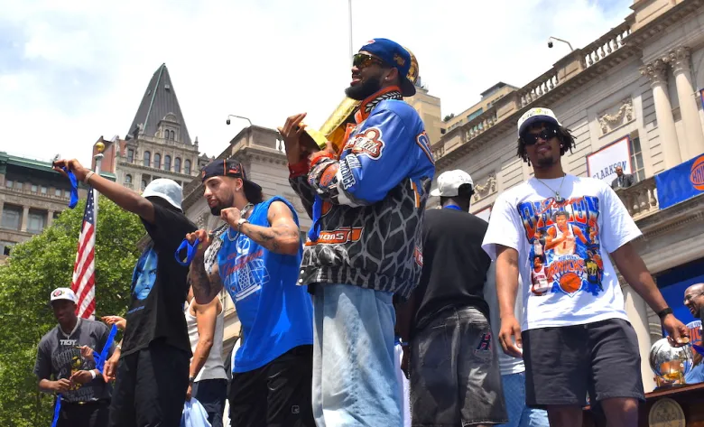 The New York Knicks team celebrate winning the 2026 NBA championship with a parade and receive keys to the city on June 18. (Ariama C. Long photo)