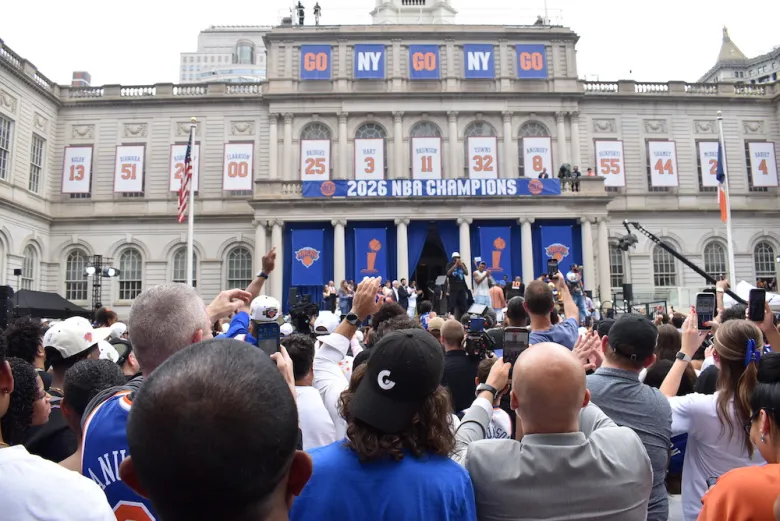 An excited crowd takes photos of the New York Knicks players arriving at the City Hall celebration after the parade on June 18, 2026. (Ariama C. Long photo)