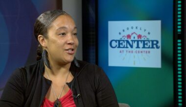 Woman being interviewed in a television studio
