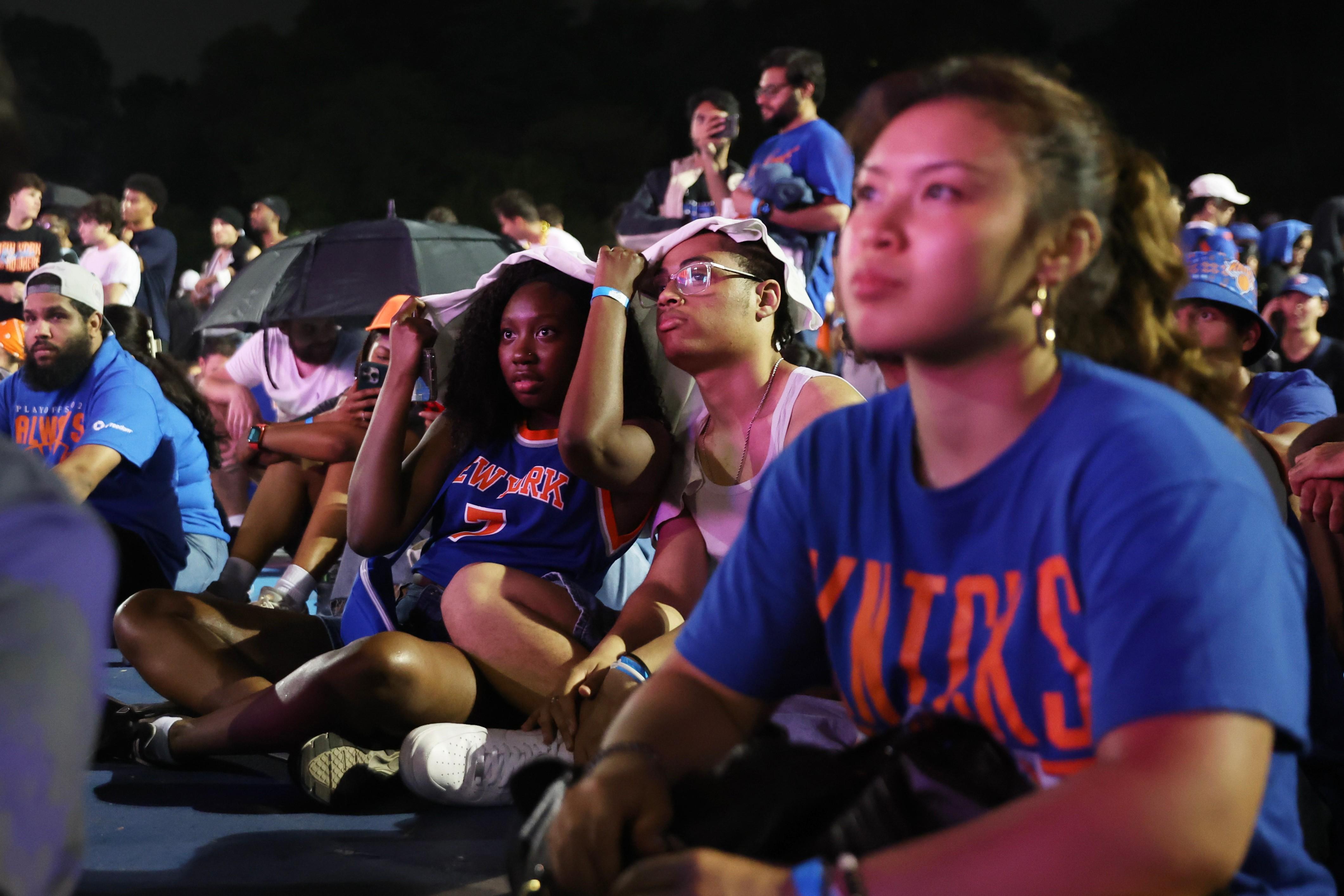 Knicks fans gather for a watch party inside Central Park...
