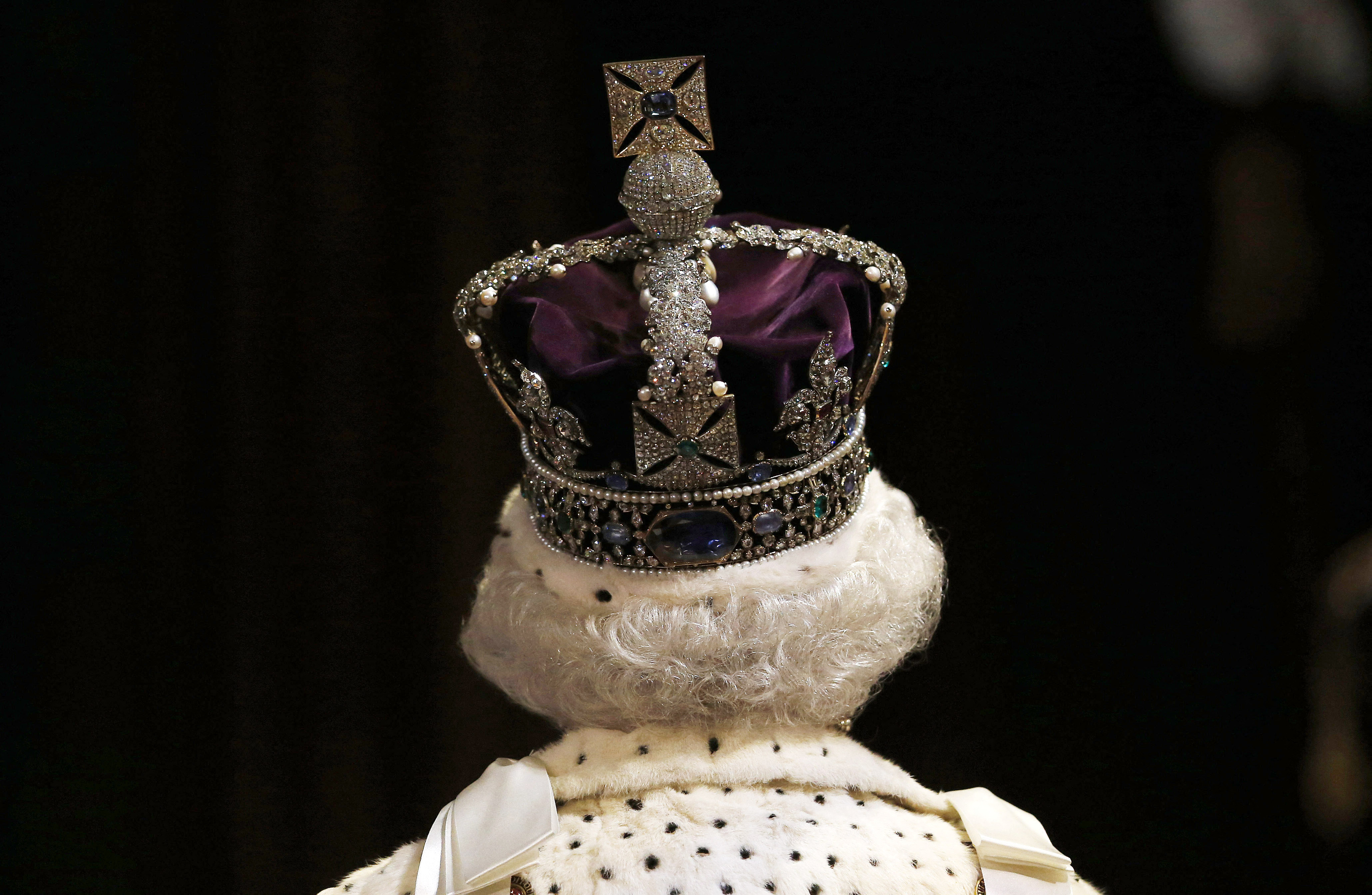 The back of Queen Elizabeth's head wearing the Imperial State Crown